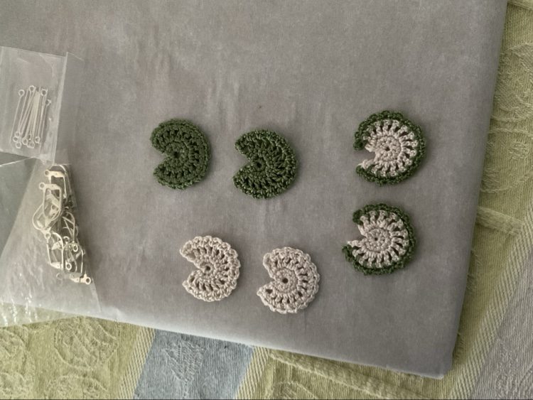 Crochet pieces in progress on Jackie's table